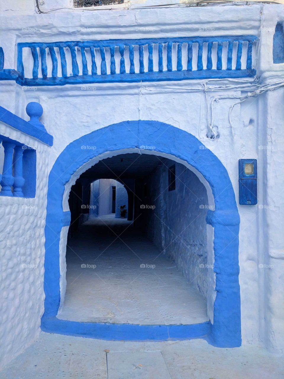 Chefchaouen painted cool blue arch/doorway