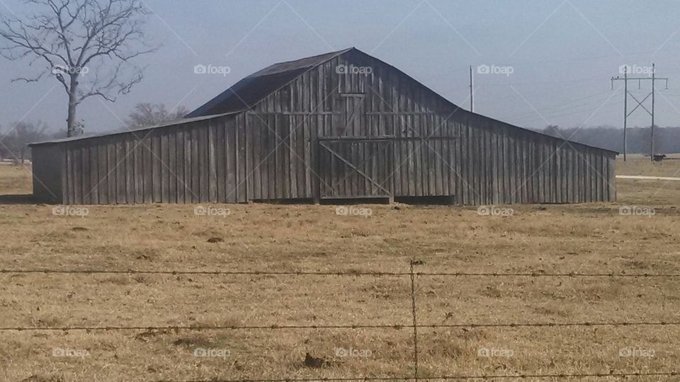 an old wood barn in the country
