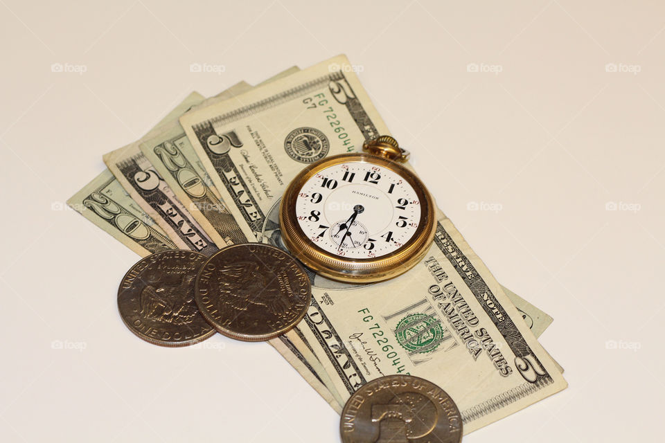 Money and stop watch
