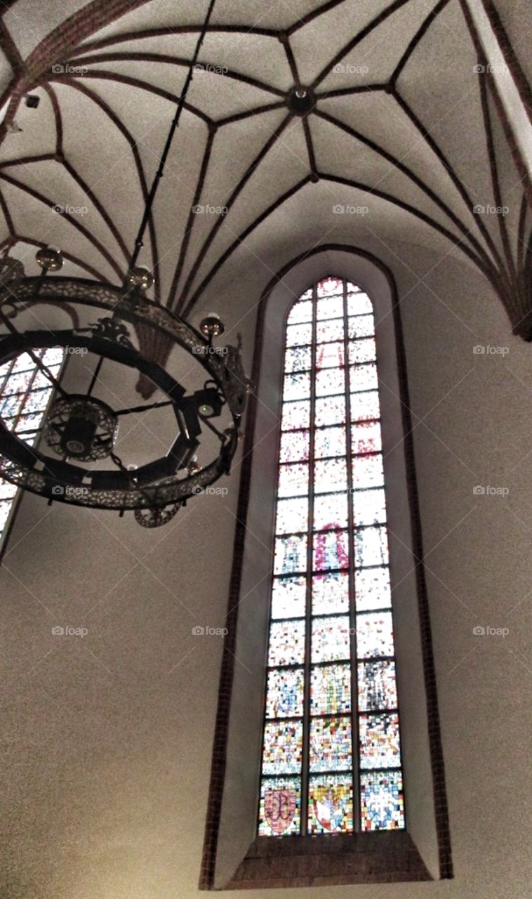 Chandelier hanging inside cathedral 