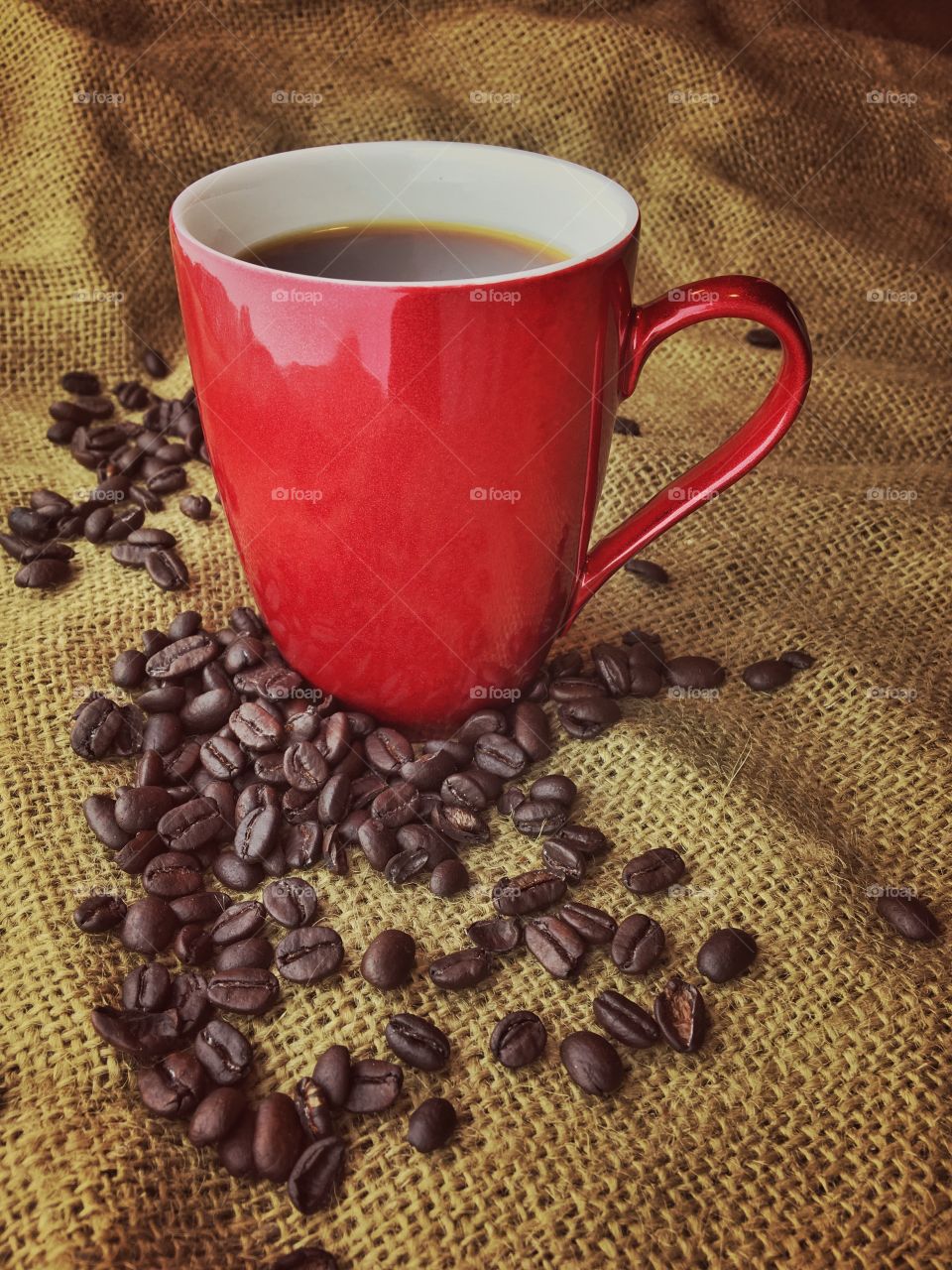 Red Cup of Coffee with Beans 2
