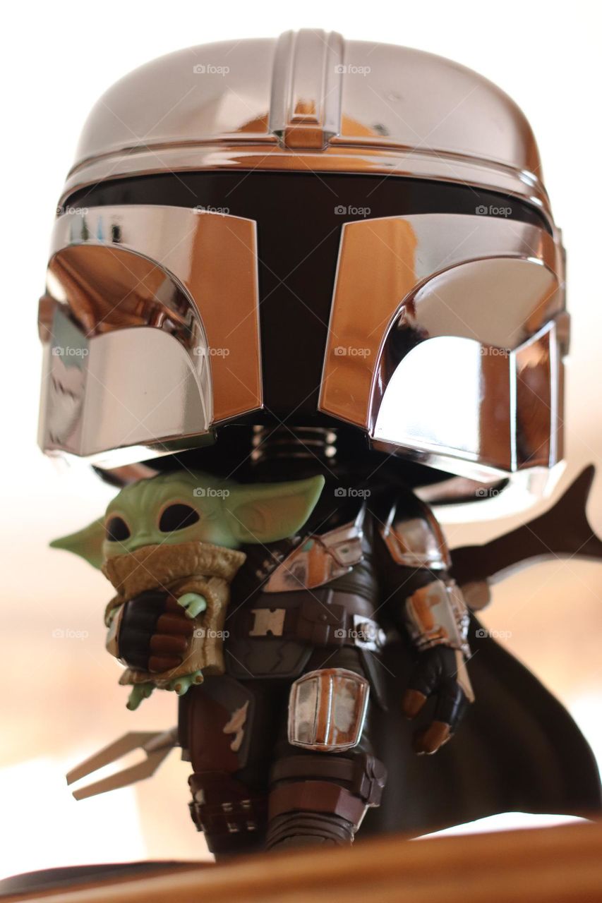 The Mandalorian with baby Yoda