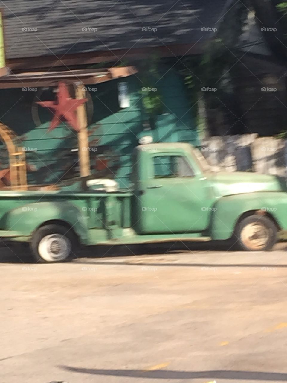 Old truck in front of an antique store 