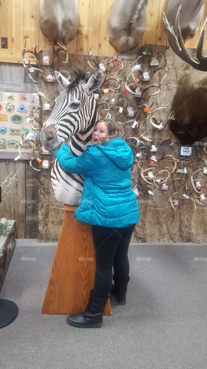 Lets hug a zebra!
