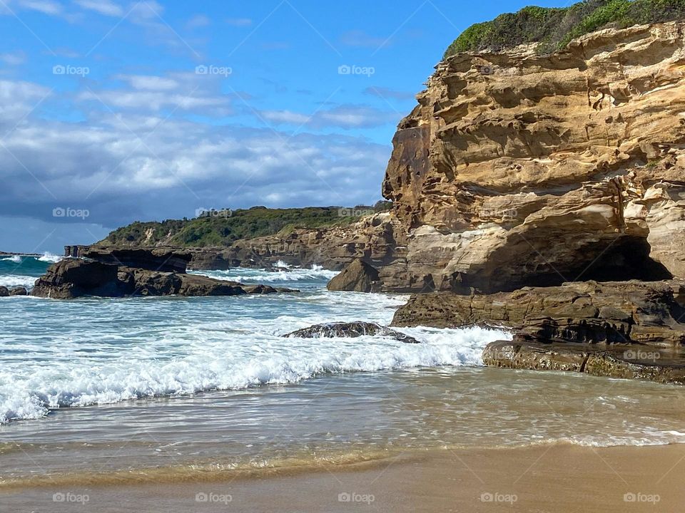 favourite place for a walk along the beach and through the caves. photograph taken at caves Beach New South Wales Australia .