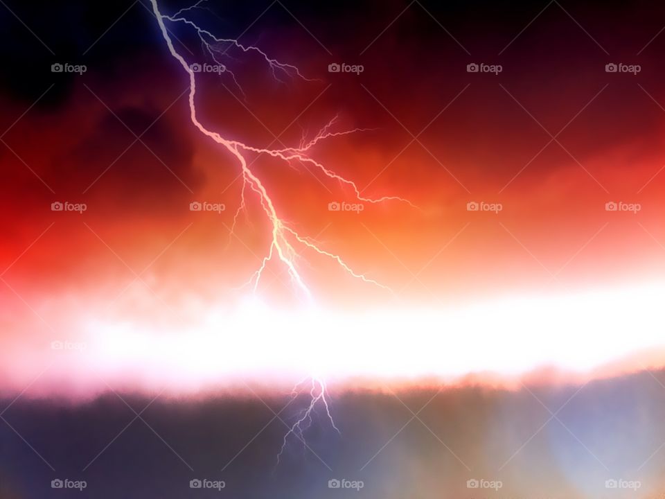 Orange sky with lightning.