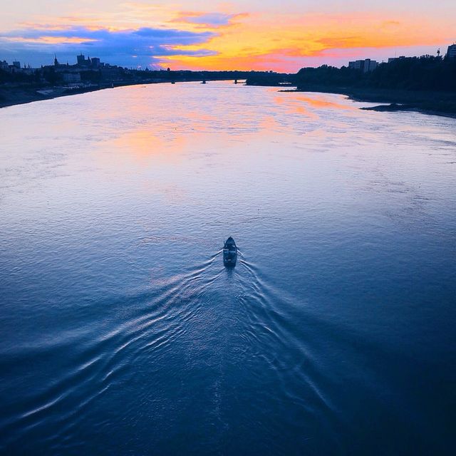 Sailing on Warsaw river . Boat sailing on river in Warsaw 