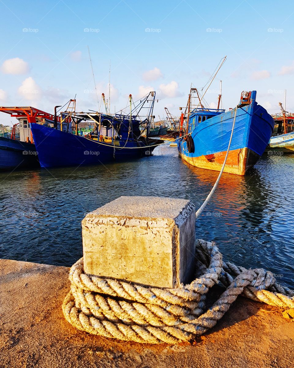 The fisherman boats are at the harbor