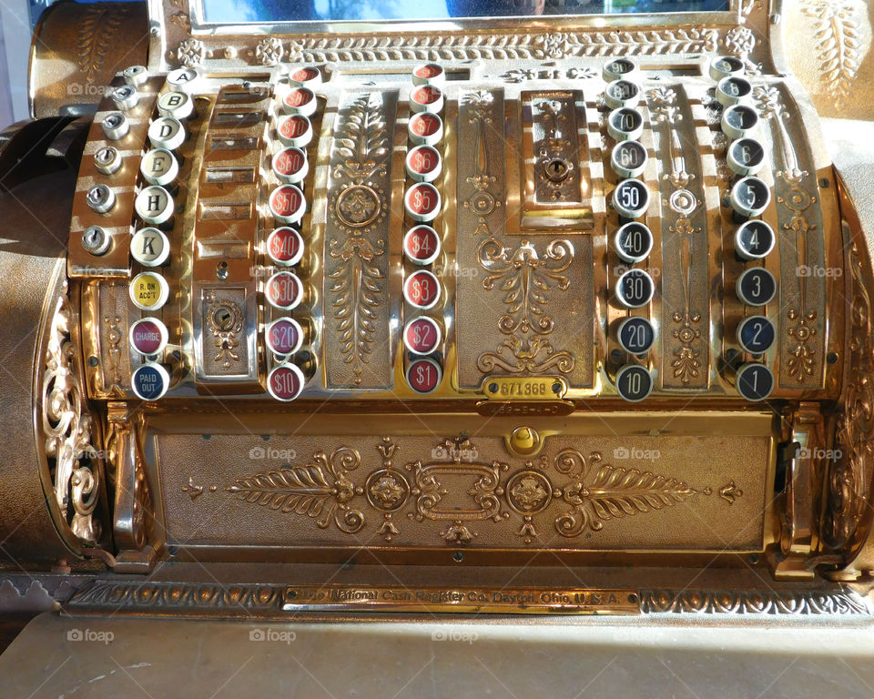 Antique National Cash Register! Notice the beautiful oak cabinet with draws!