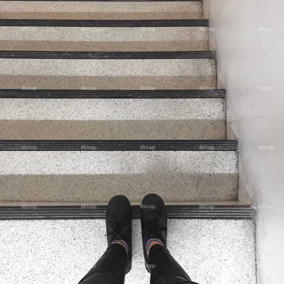 Woman standing at staircase. Woman standing at staircase. Selfie