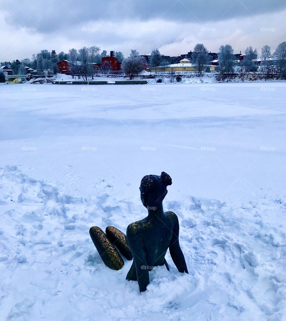 Catherine Vasa of Sweden statue in snow, Verkatehtaanpuisto, Old town Helsinki Finland