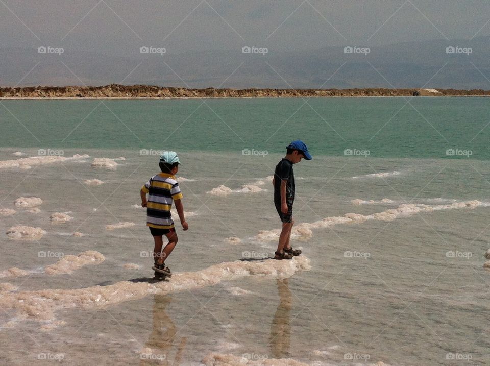 Dead Sea . Walking over the salt of the Dead Sea