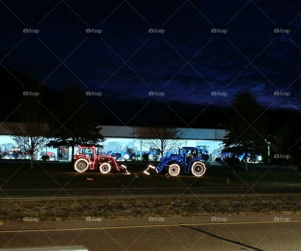Tractors in red and blue lights