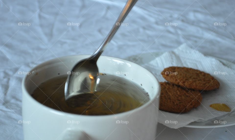 Spoon in tea