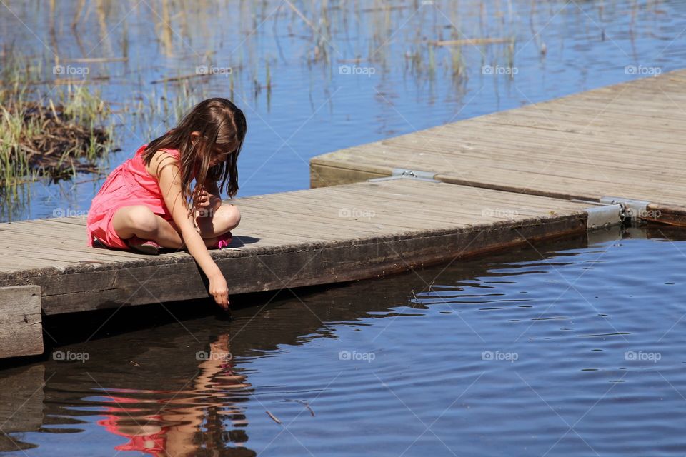 Playing by the lake. 