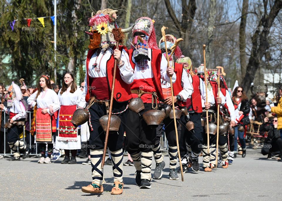 Kukeri are elaborately costumed Bulgarian man, who perform traditional rituals intended to scare away evil spirits. Until recently, all Kukeri were man, but now we can also see women 🙂