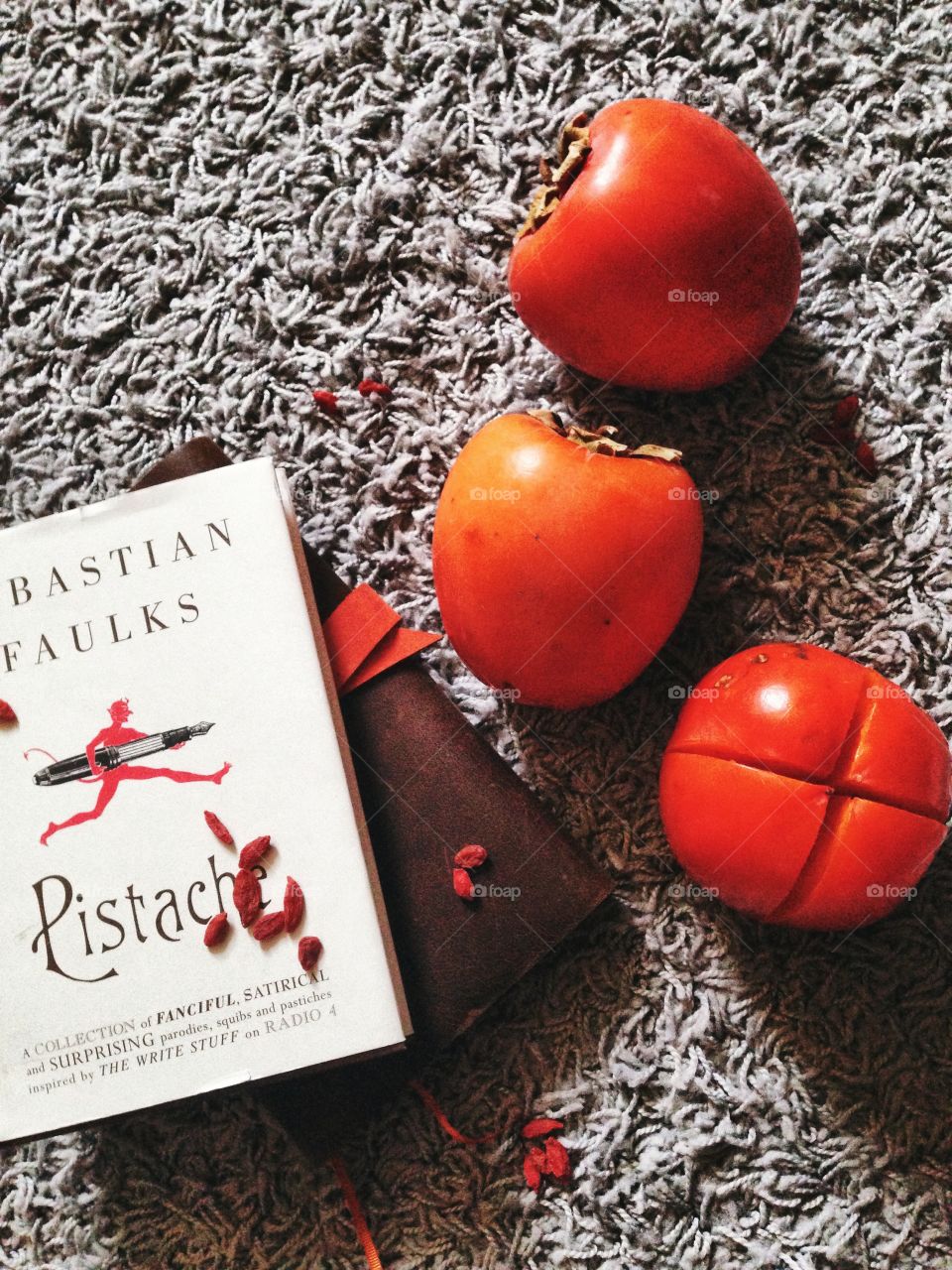 Breakfast . Persimmons and berries with books 