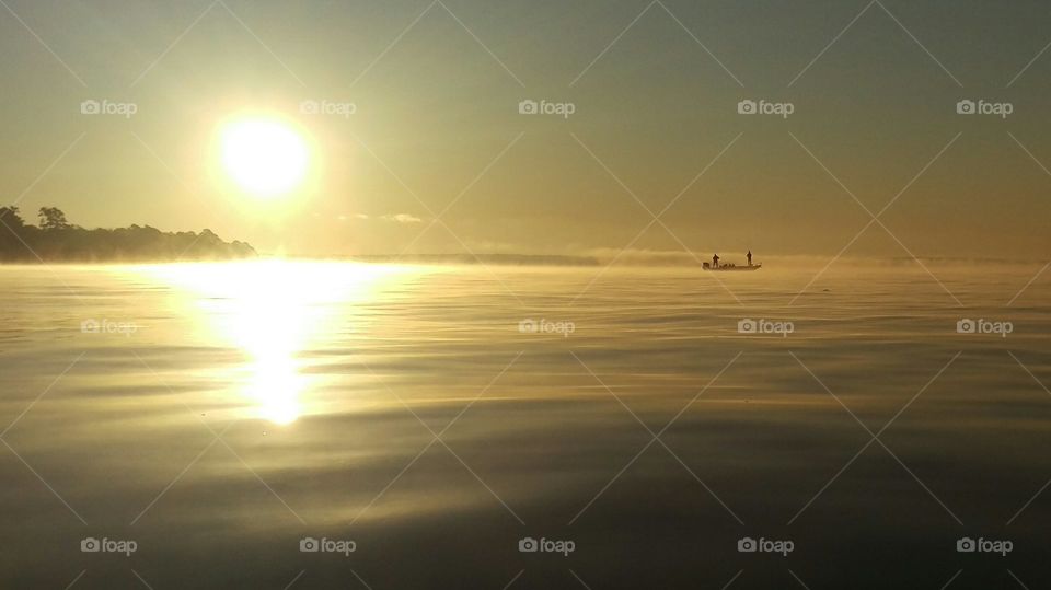 fishing at sunrise