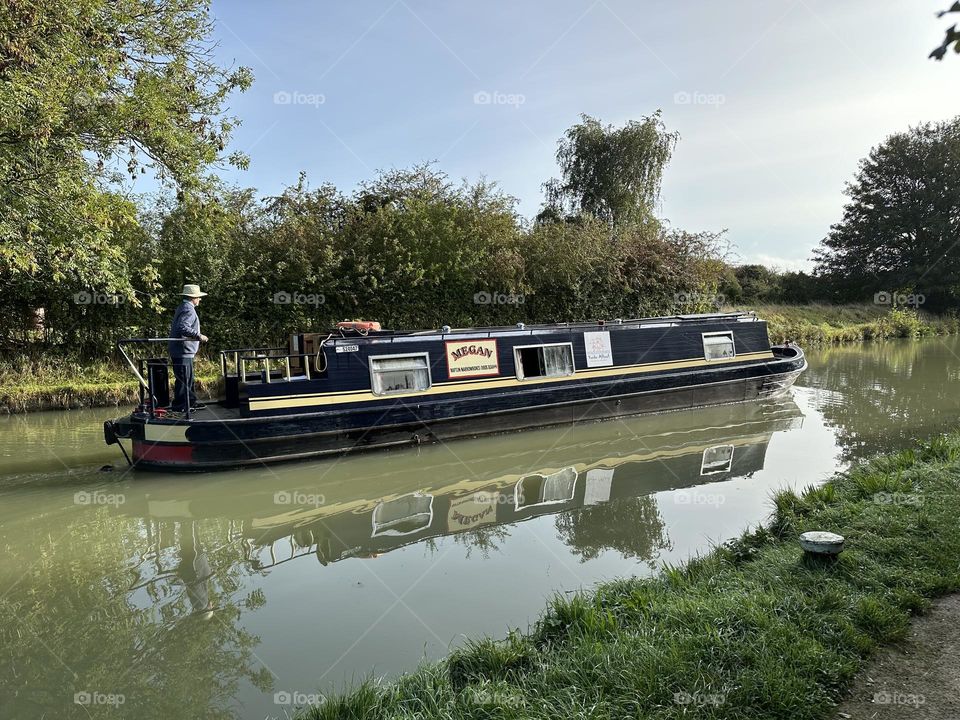 Hillmorton locks near Rugby Oxford canal England narrowboat cruise holiday vacation historic waterway gorgeous clear sky late summer weather