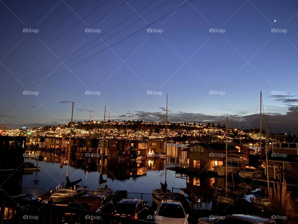Calm water reflections at night