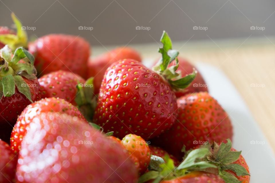 Red strawberries on the plate