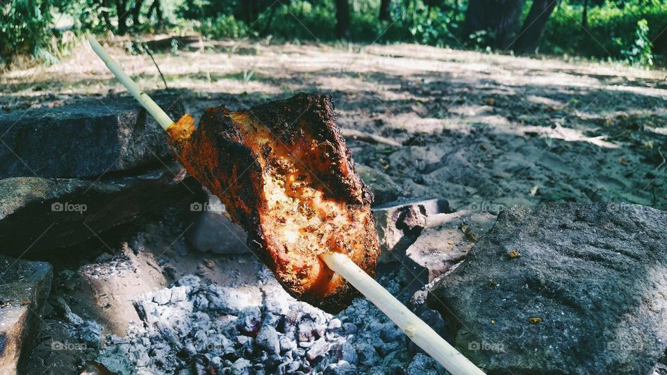 grilled sea bass on charcoal