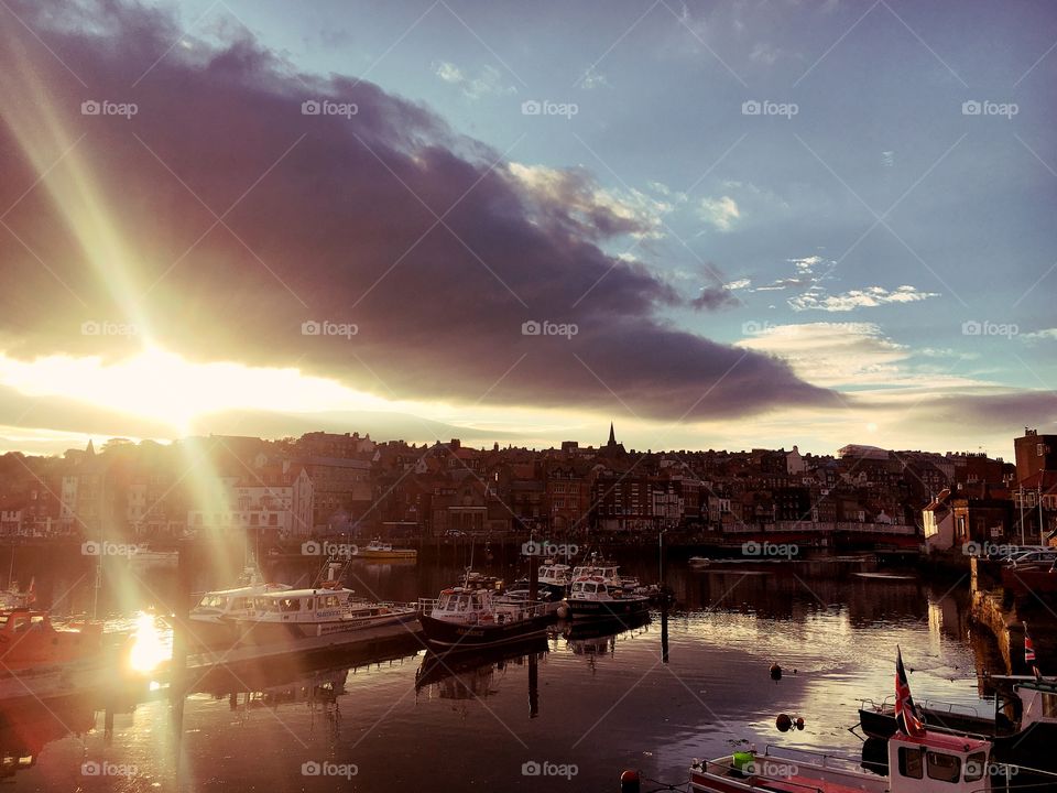 The sun beginning to set over Whitby. 