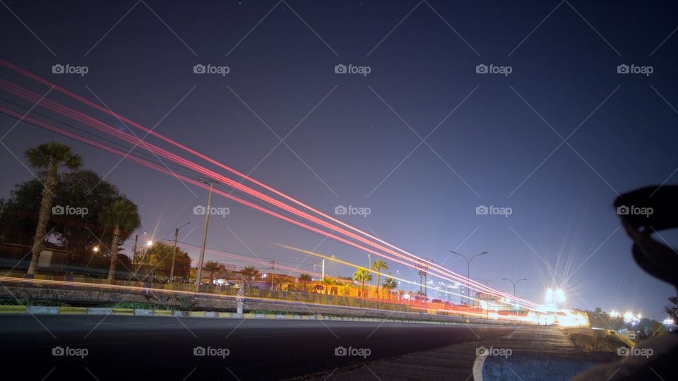 Long Exposure light trails coming from cars.