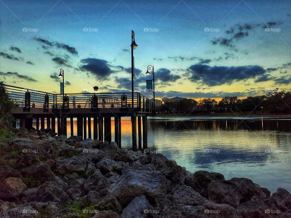 I love to go to Cranes Roost Park in Altamonte Springs, Florida. I was sitting by the lake and took this photo of a sunset.