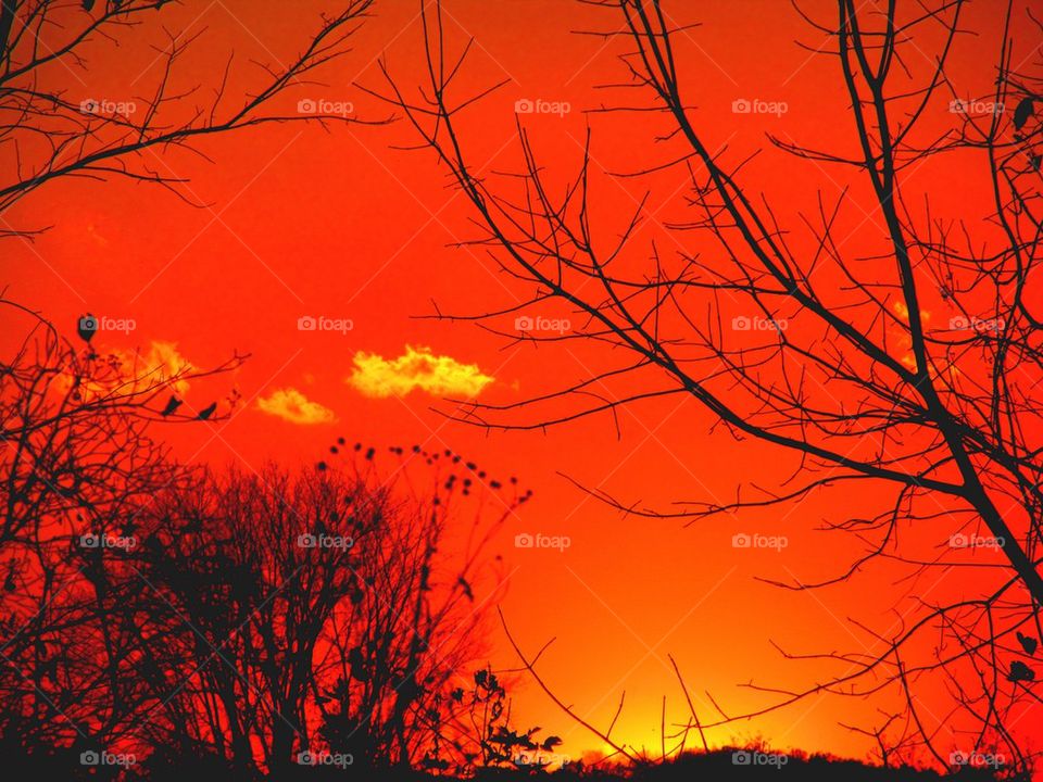 Amber red winter sunset in Farrell Pennsylvania 