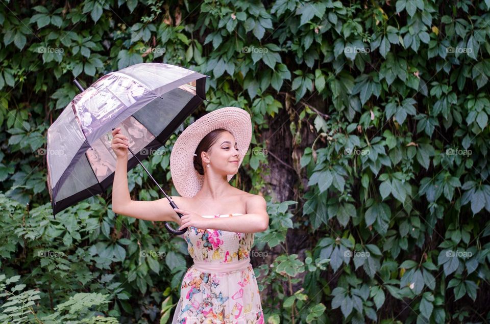 Pretty Young Girl Posing with Umbrella