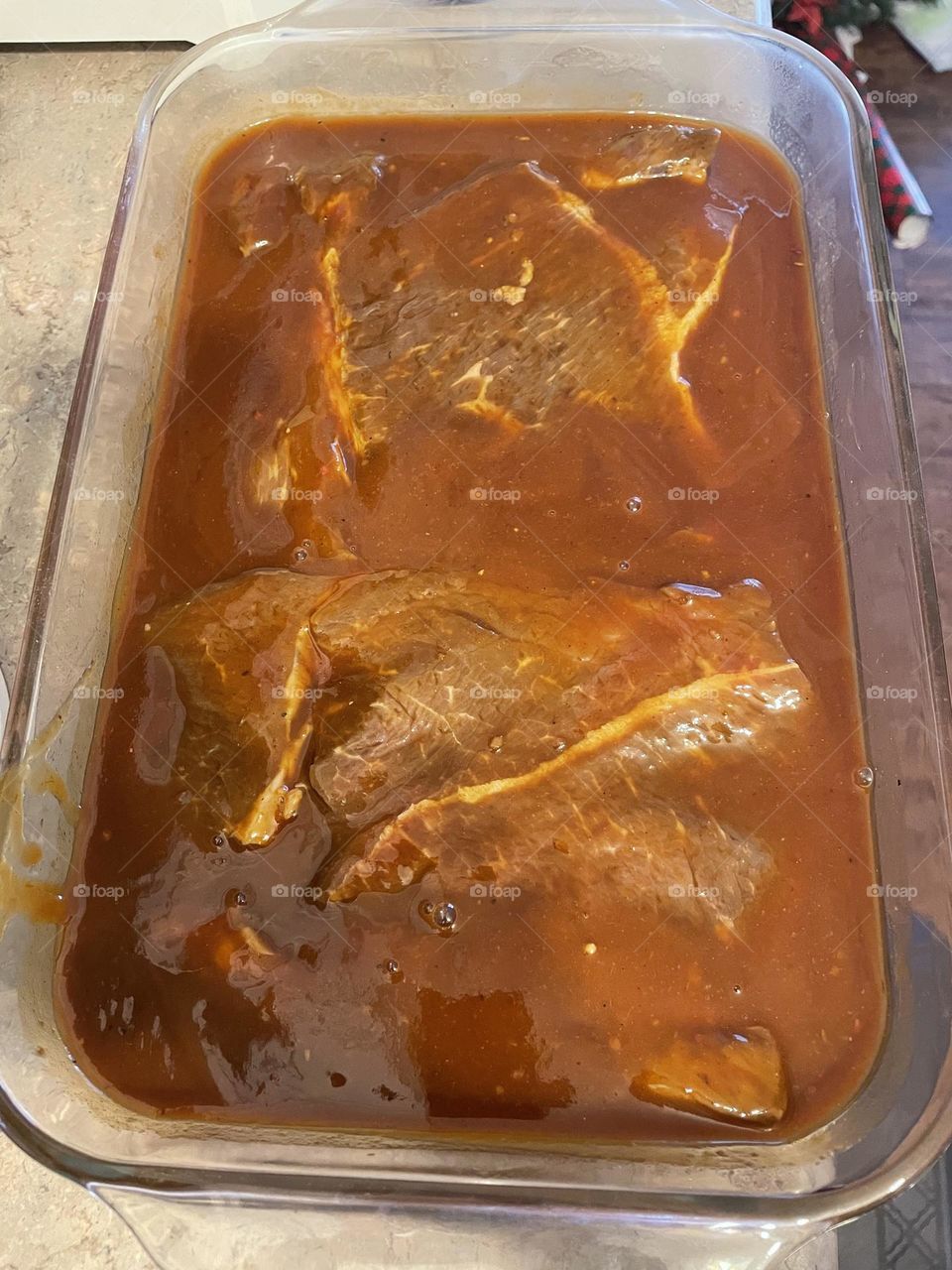 Marinating delicious steaks, in my own homemade marinate, getting ready for the bbq