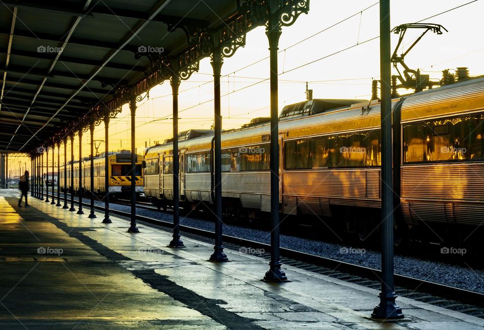 Railway platform at sunset