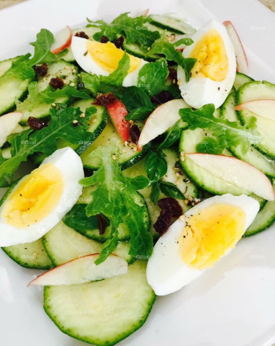 Lettuce salad with egg and cucumber
