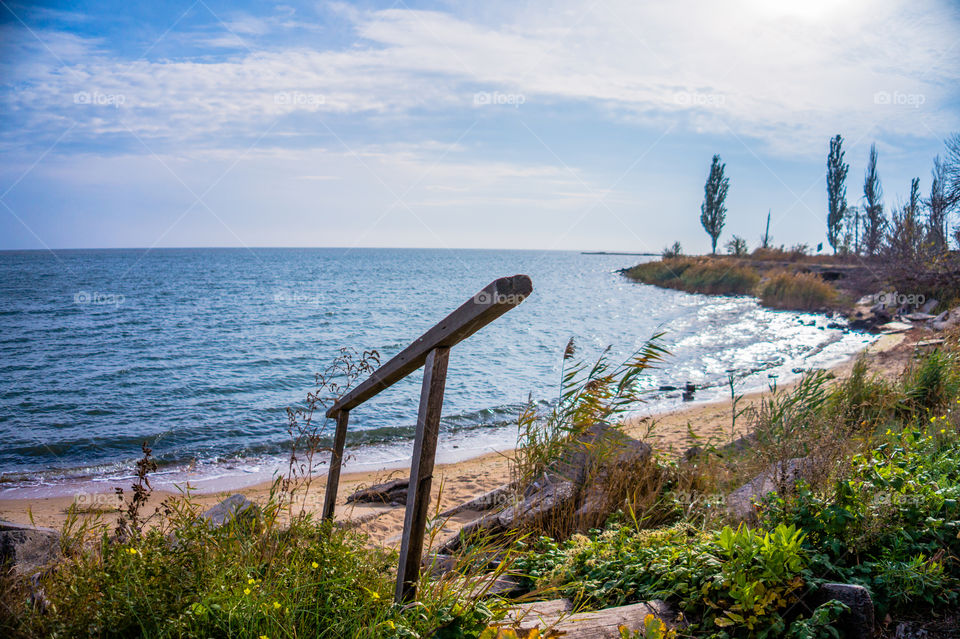 Descent to the seaside along the old wooden stairs