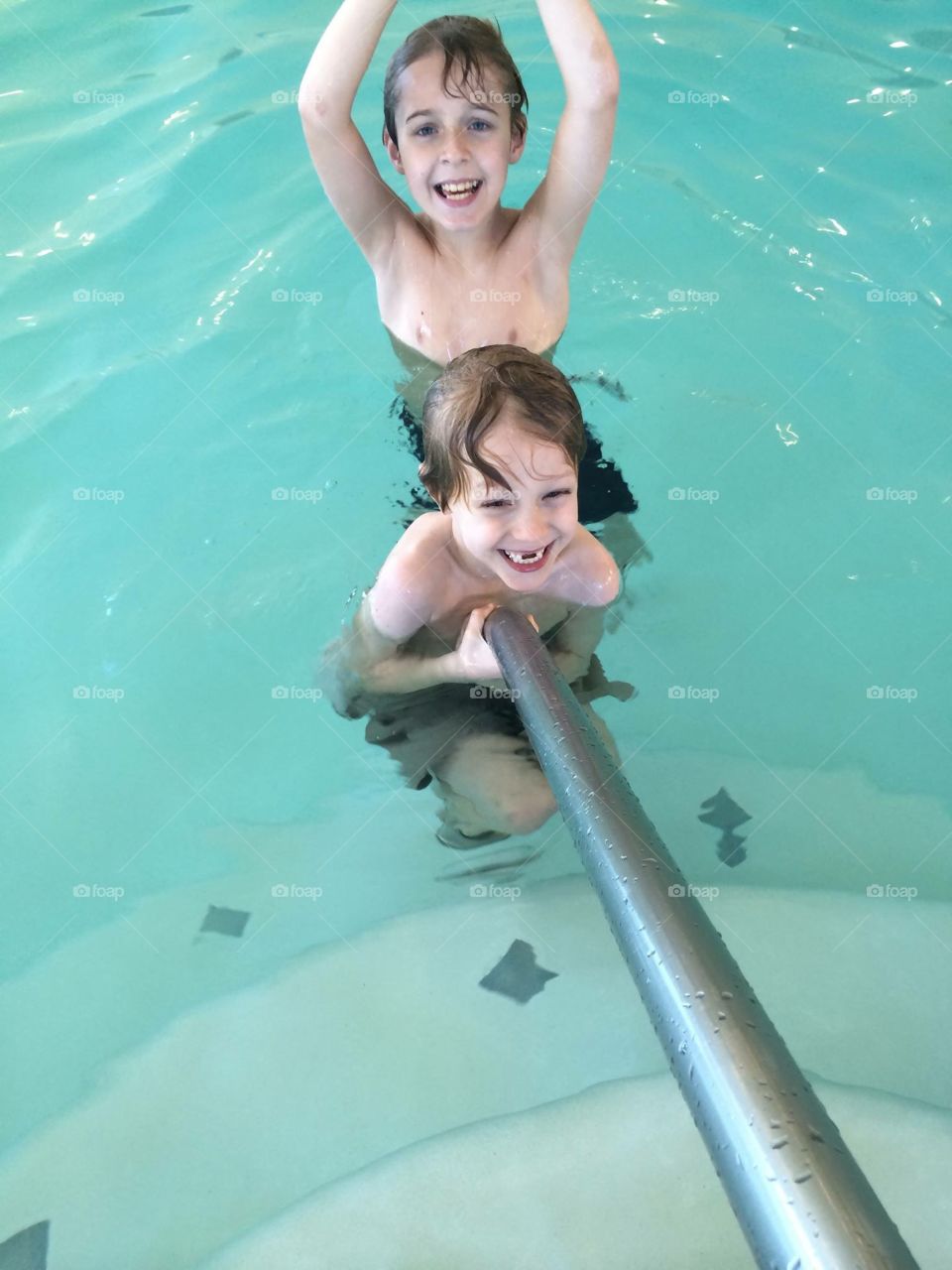 My boys having a blast at the indoor swimming  pool