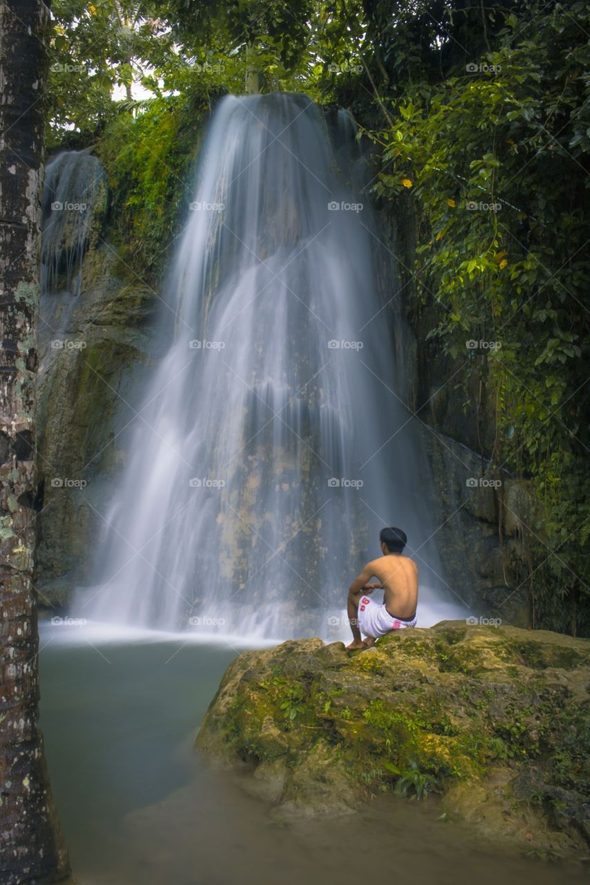 Relax and enjoy, looks waterfall makes you feel calm.