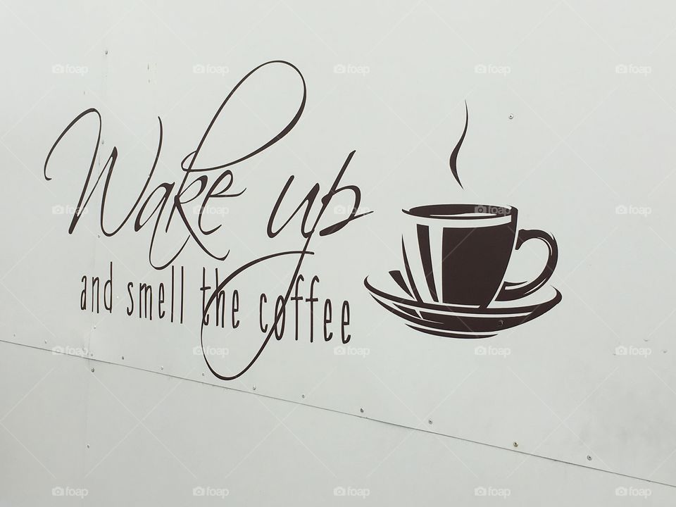 Wake up and smell the coffee sign