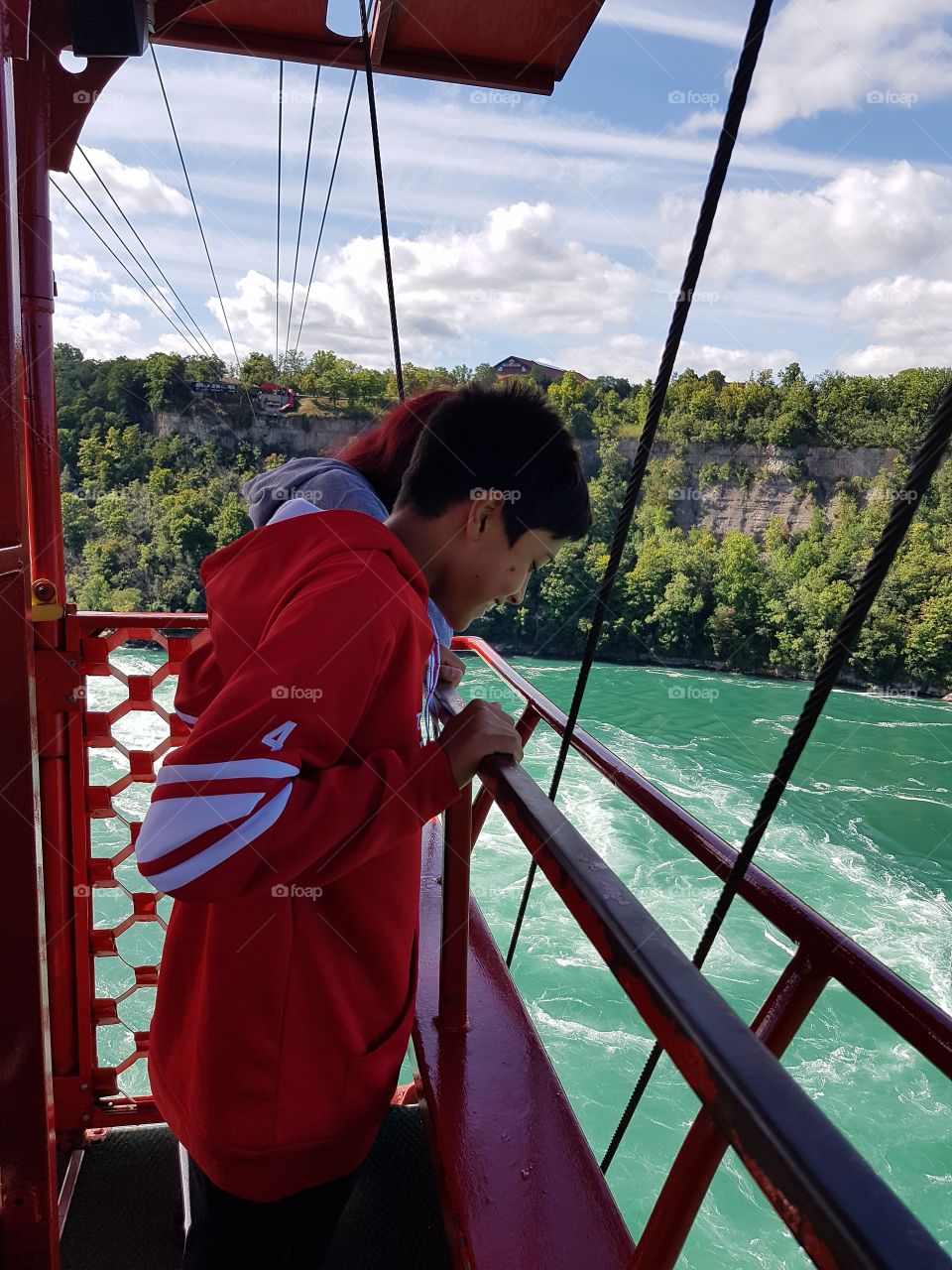 Teens riding aero car in Niagara