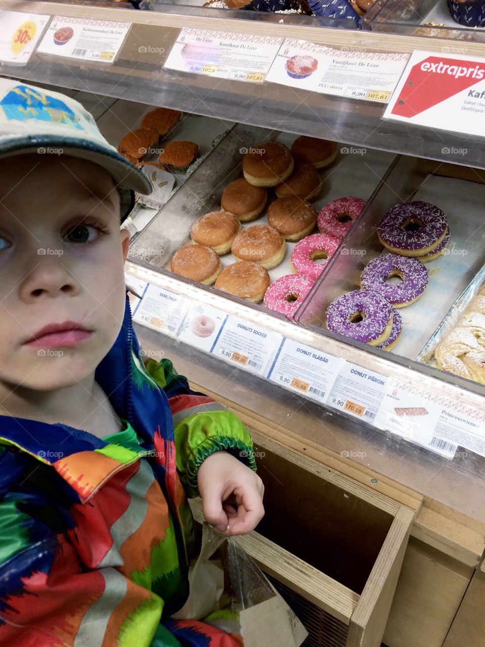 Shopping. Boy in the grossery store