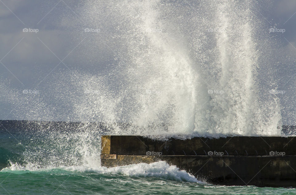 High waves at the harbour wall