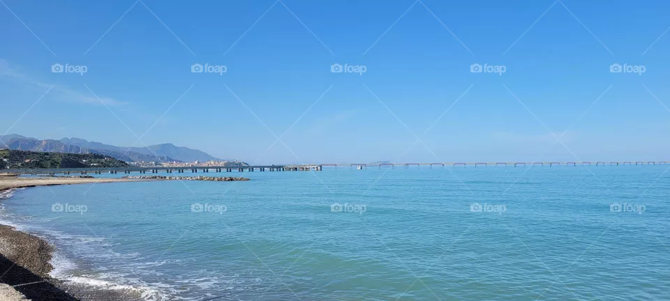 along the sea jetty