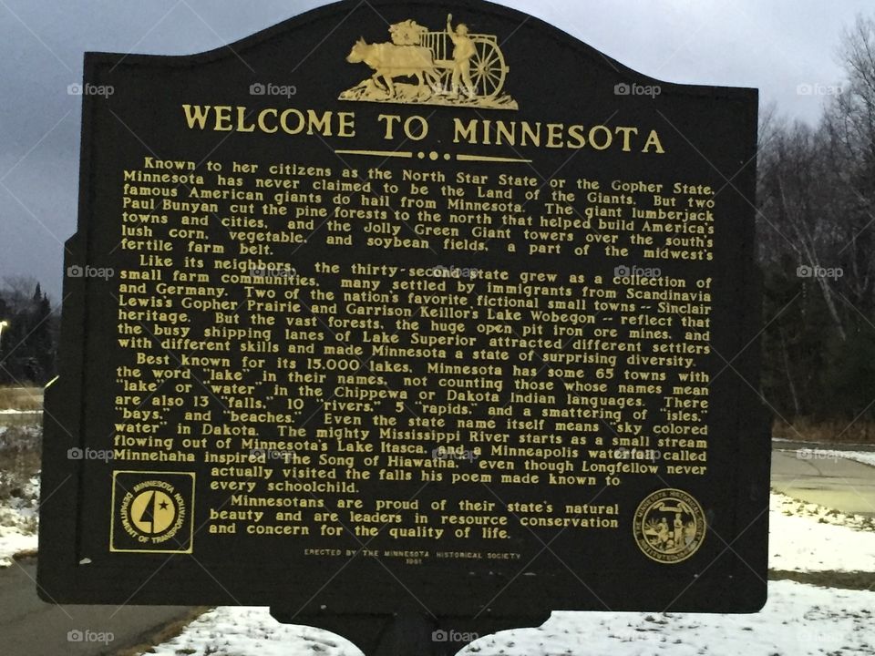 A historical marker welcomes and educates visitors to Minnesota from Canada near Grand Portage. 