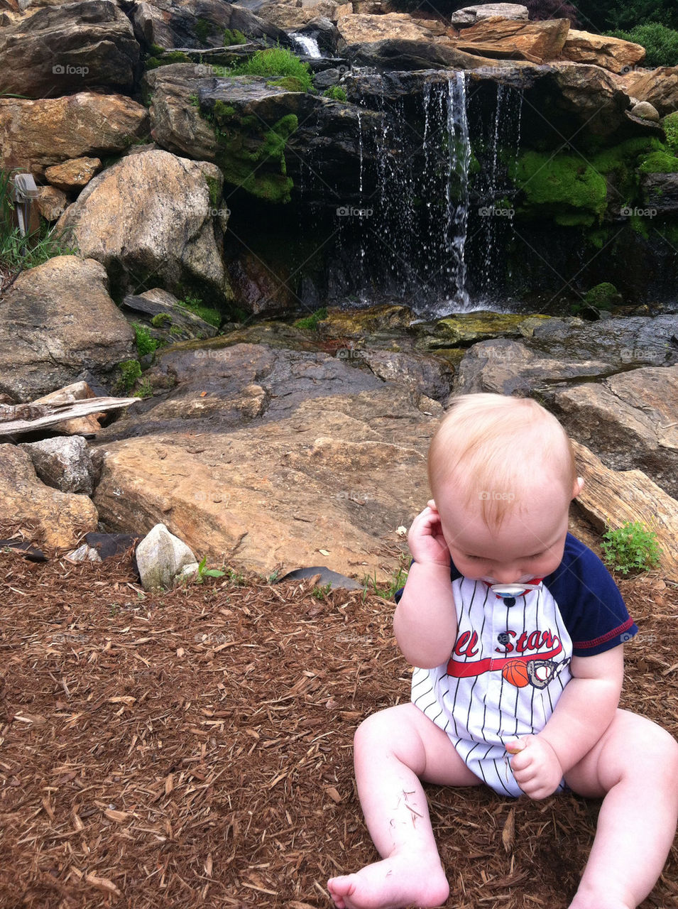 WATERFALL AND BABY