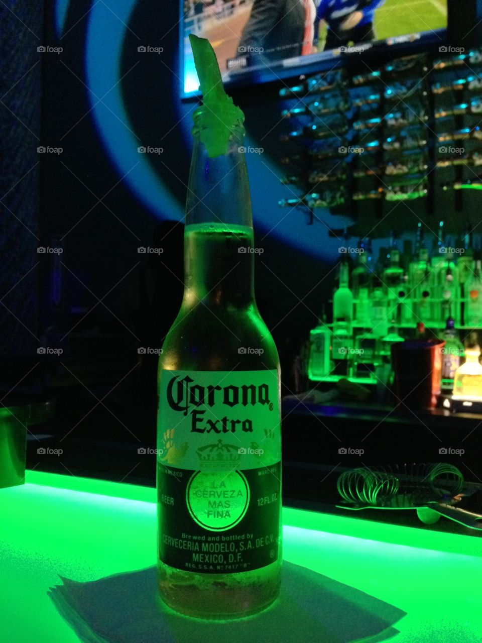 Having a drink at a local club in the early hours in Miami Florida , Corona Extra looking good with the back light 