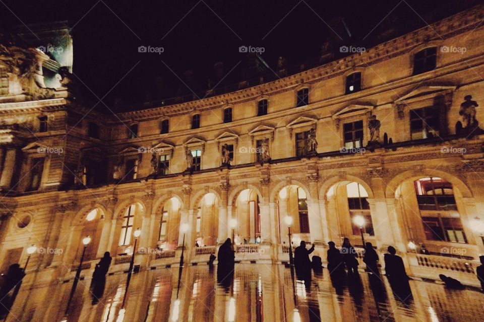 Louvre museum at night. 