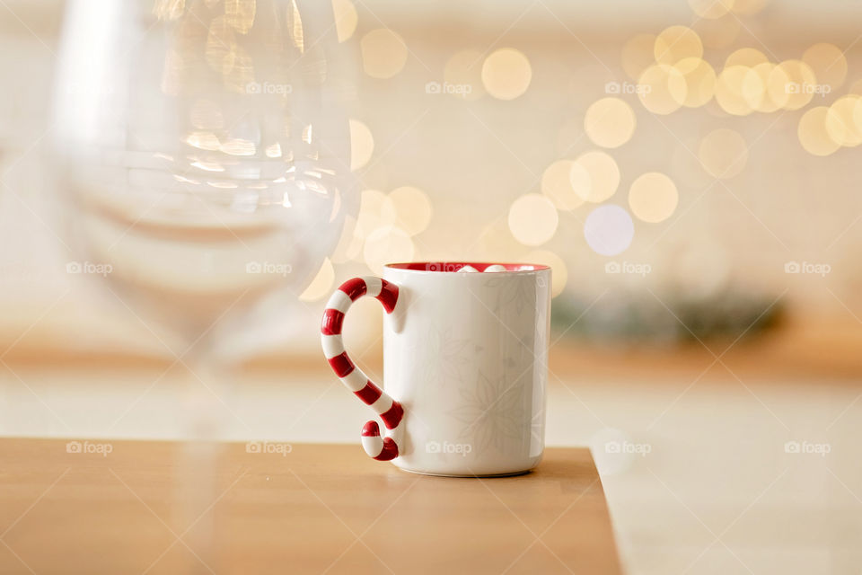 cup of coffee in a cozy festive Christmas atmosphere