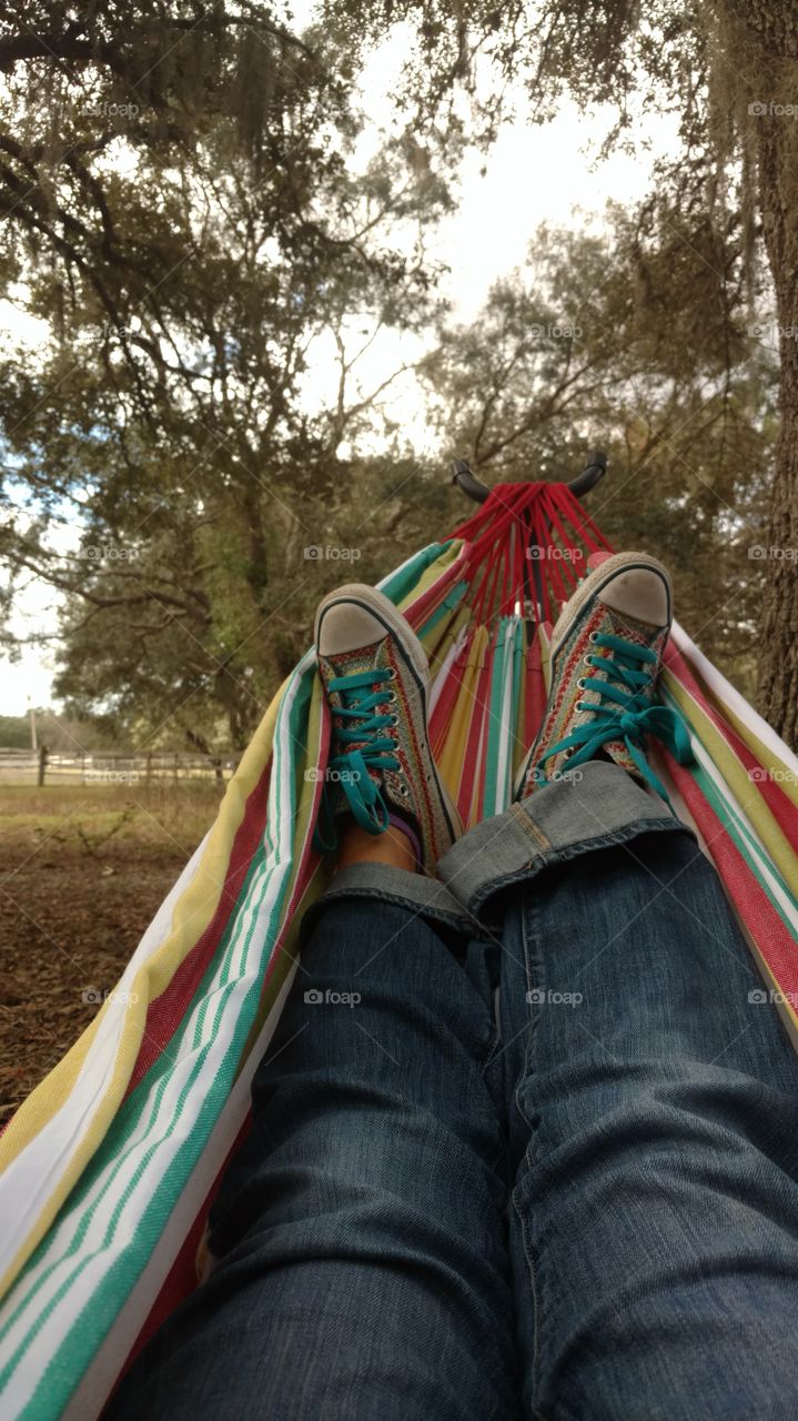 colors and more colors. converse shoes on hammock