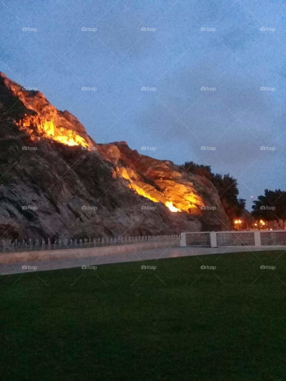a cliff with lights