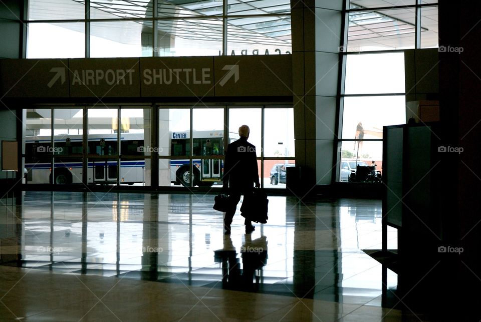 Traveler leaving airport